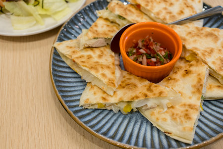 Tasty Mexican quesadillas slices of breadの写真素材