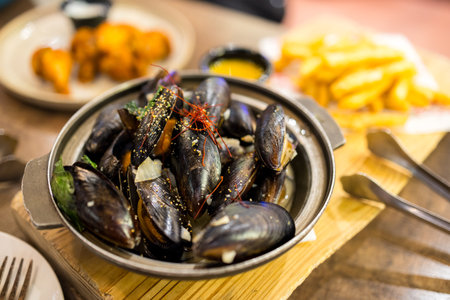 Mussel dish in the restaurantの写真素材