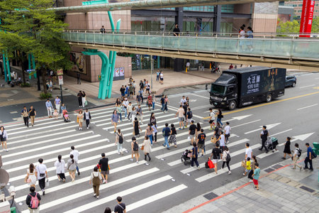 Taipei, Taiwan 07 October 2023: Top view of people cross the road in Taipei cityのeditorial素材