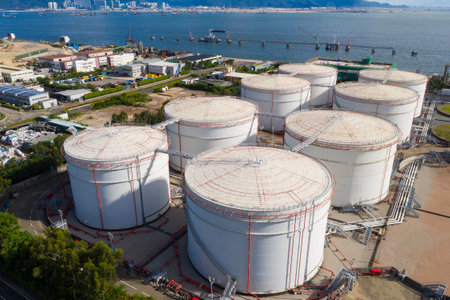 Tuen Mun, Hong Kong 19 July 2020: Coal fired power plant with oil tank in Hong Kong
