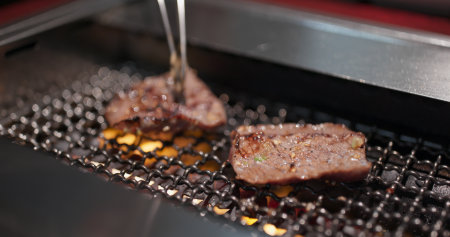 Japanese style meat barbecue at restaurantの写真素材