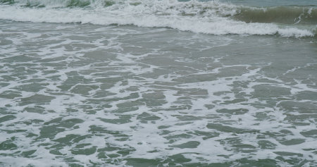 Sea wave splash on the beach