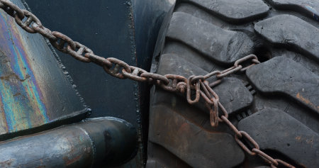 Chain on tire on boat
