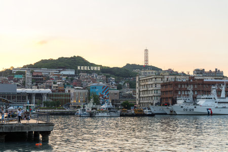 Keelung, Taiwan 06 July 2023: Inner Harbor of Keelung city at sunset