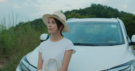 Travel woman look at the scenery view on her road trip