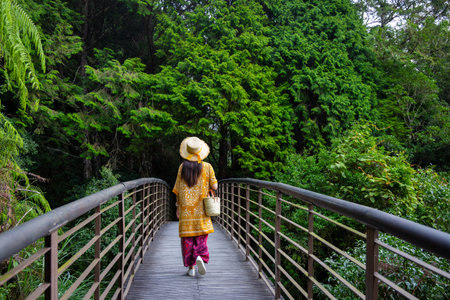 Woman walk in the trail at countrysideの写真素材