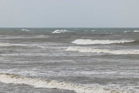 Big sea wave crashing at coastline