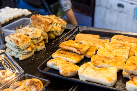 Sell baked wheat cake in the street market
