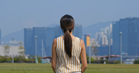 Woman look around the city