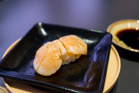 Scallop sushi on the sushi plateの写真素材