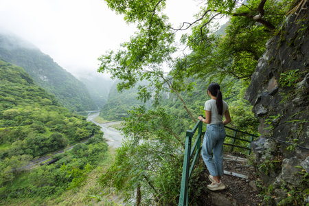 Woman hike in the forest mountain