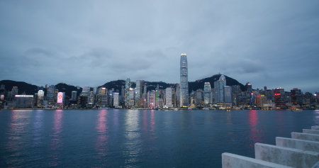 Victoria Harbor, Hong Kong 10 February 2021: Hong Kong city at evening time