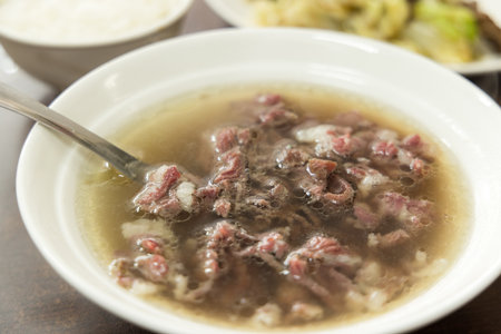 Fresh raw beef soup in Taiwan food storeの写真素材