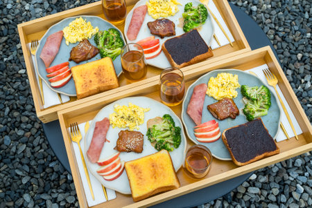 Top view of breakfast on the cupboard in coffee shopの写真素材