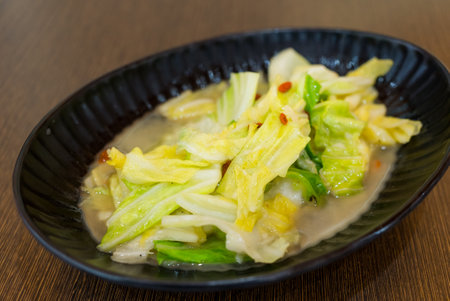 Chicken soup with cabbage on dishの写真素材
