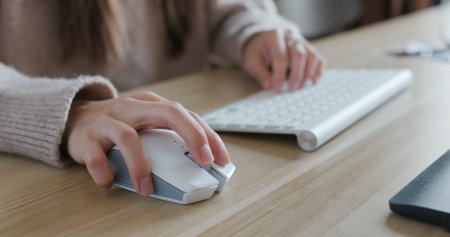Woman using computer at officeの写真素材