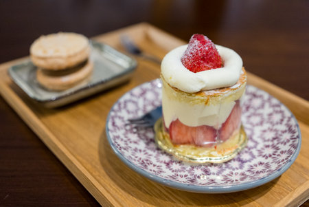 Strawberry cake with coffee in restaurantの写真素材