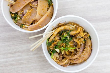 Chili satay sauce squid in the night marketの写真素材