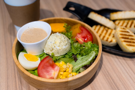Fresh salad in the wooden bowlの写真素材
