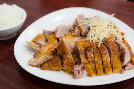 Slice of goose meat on plate at restaurantの写真素材