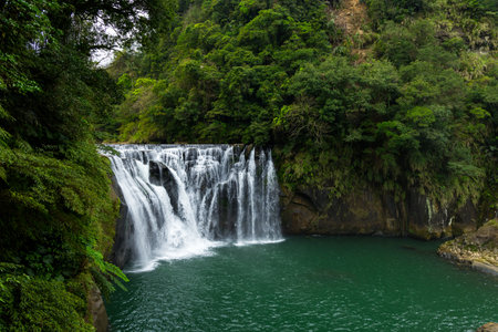 Beautiful Shifen waterfall in Pingxi at Taiwanの写真素材