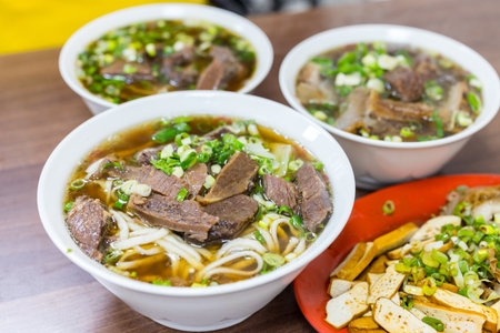 Braised beef noodle soup in restaurantの写真素材