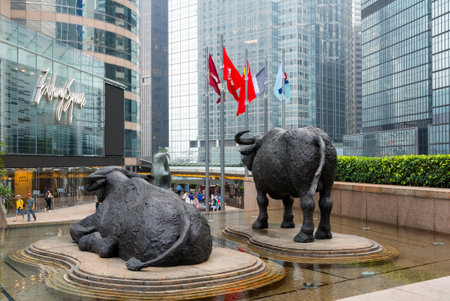 Central, Hong Kong 01 April 2024: Two buffalo statues, Exchange Square at Hong Kong centralの写真素材
