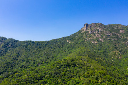 Lion Rock mountain with blue sky in Hong Kongの写真素材