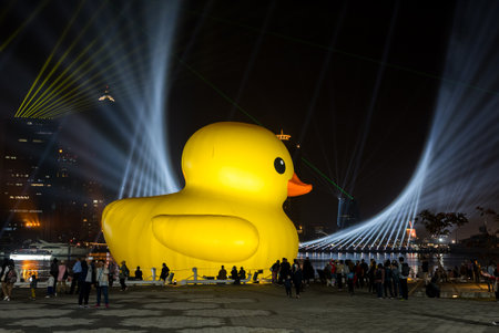 Taiwan, 31 January 2024: Kaohsiung bay under night show with rubber duckのeditorial素材