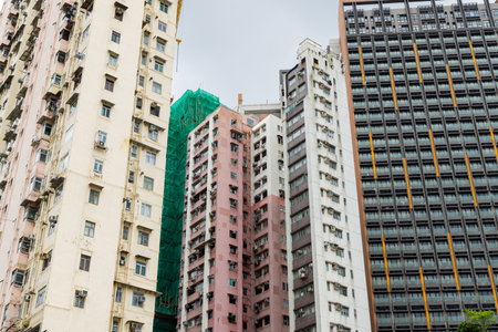 Hong Kong 23 June 2023: Crowded of the building facade in Hong Kong cityのeditorial素材