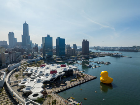 Kaohsiung, Taiwan 01 February 2024: Top view of kaohsiung city with rubber yellow duckのeditorial素材
