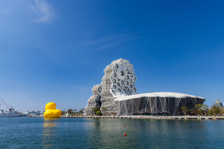 Taiwan, 01 February 2024: Kaohsiung Music Center with yellow duck floating over the bayのeditorial素材