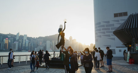 Tsim Sha Tsui, Hong Kong 15 November 2021: Star of avenue hong kong at sunsetのeditorial素材