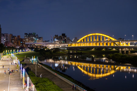 Taipei, Taiwan 22 March 2024: Taipei city in riverside at nightのeditorial素材