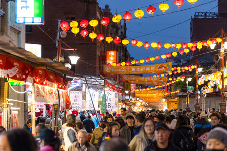 Taipei, Taiwan 26 January 2024: Traditional Lunar new year street market in Dihua street at Taipei City in the eveningのeditorial素材