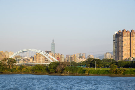 Taipei, Taiwan 07 December 2023: Taipei city downtown with river view at evening timeの写真素材