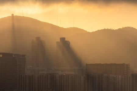 Sunlight flare over the city in Hong Kongの写真素材
