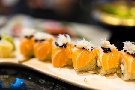Salmon sushi roll in Japanese restaurantの写真素材