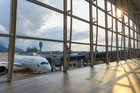Hong Kong 29 April 2024: Hong Kong International airport under sunsetのeditorial素材