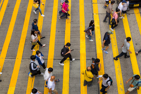 Hong Kong 23 June 2023: Top down view of the people cross the roadのeditorial素材