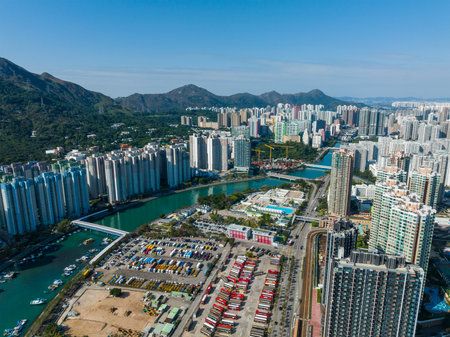 Tuen Mun, Hong Kong 05 February 2022: Drone fly over Hong Kong residential districtのeditorial素材