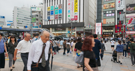 Tokyo, Japan, 25 June 2019: People cross the road in Ueno city streetのeditorial素材