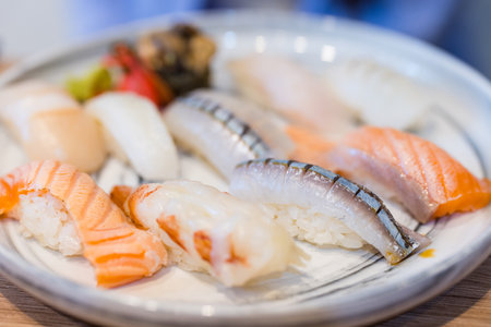 Gourmet assorted sushi beautifully presented on platterの写真素材