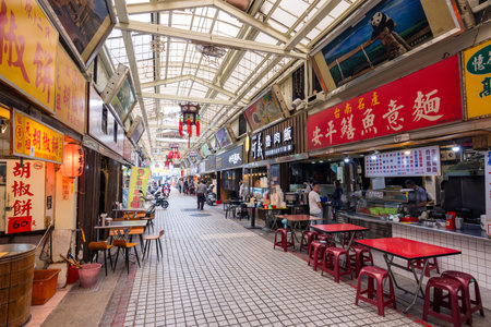 Taipei, Taiwan 17 October 2023: Huaxi Street Tourist Night Market in Taipeiの写真素材