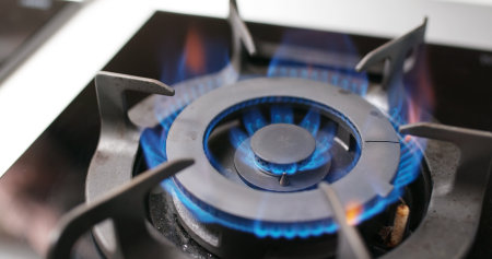 Gas burning from a kitchen gas stoveの写真素材