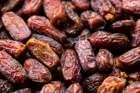 Dried date fruits in a pileの写真素材