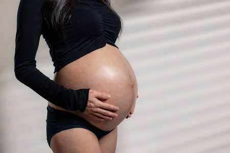Pregnant woman with her tummyの写真素材