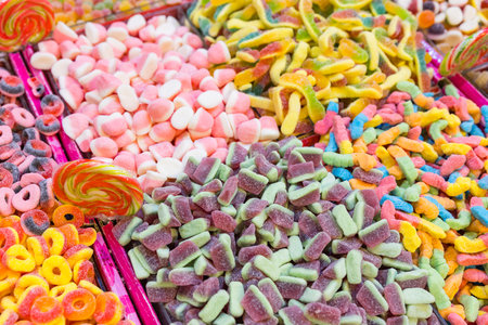 Colorful gummy candy assortment in market displayの写真素材