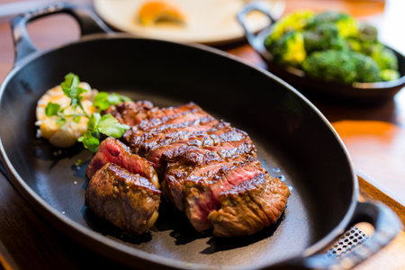 Sliced of grilled steak rib eye medium rare statusの写真素材