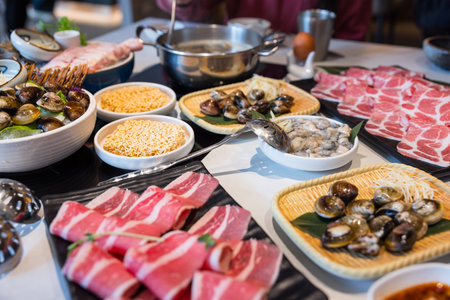 Delicious raw seafood and meat for hotpotの写真素材